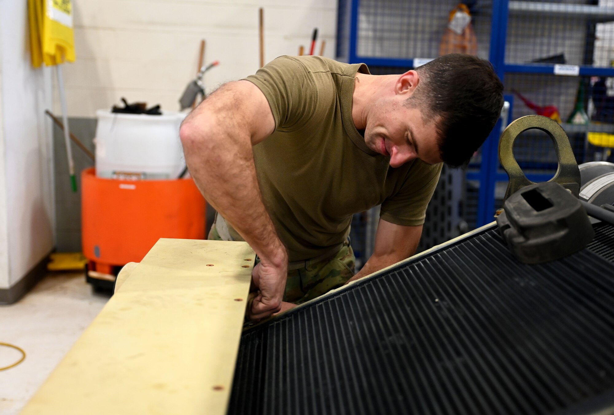 Sergeant works on engine