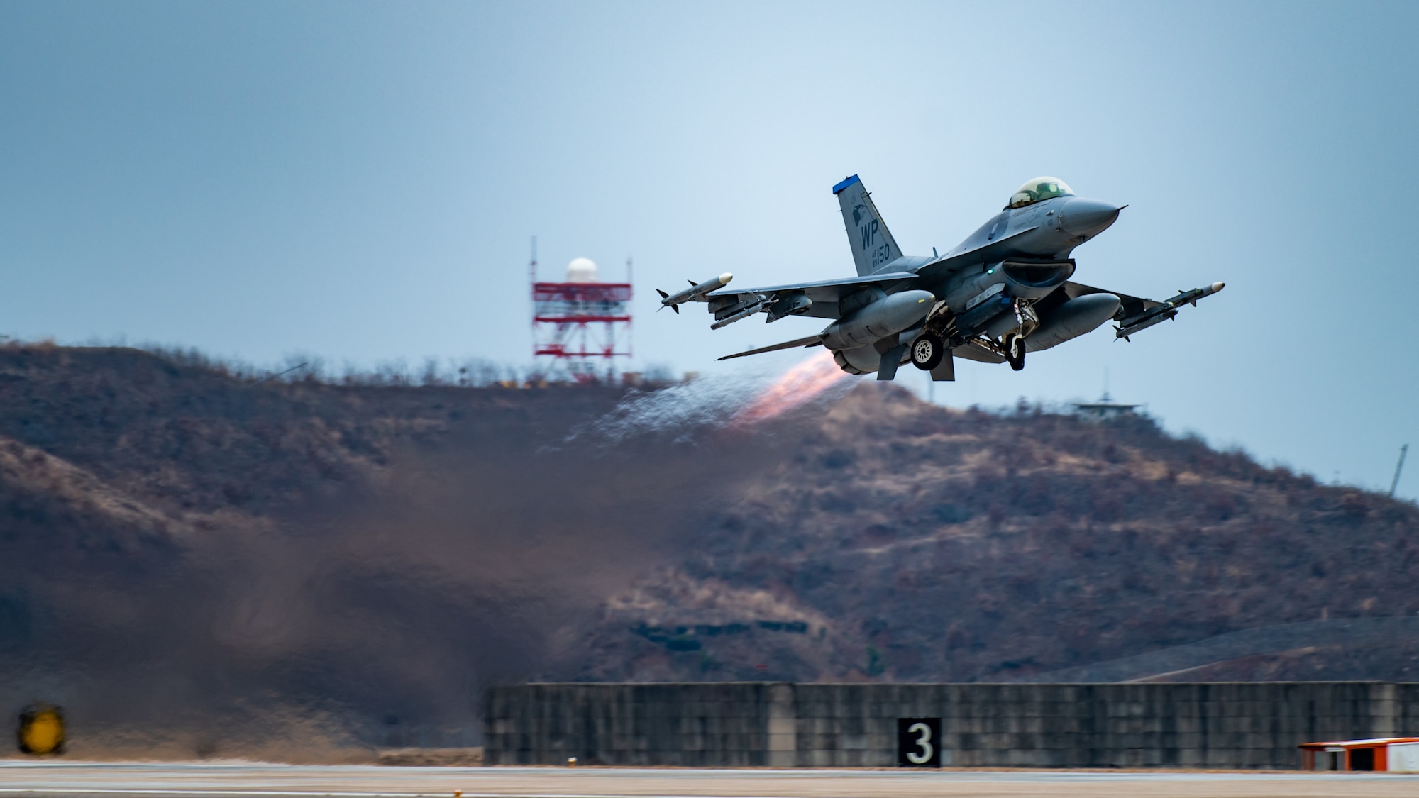 An F-16 Fighting Falcon assigned to the 35th Fighter Squadron takes off.