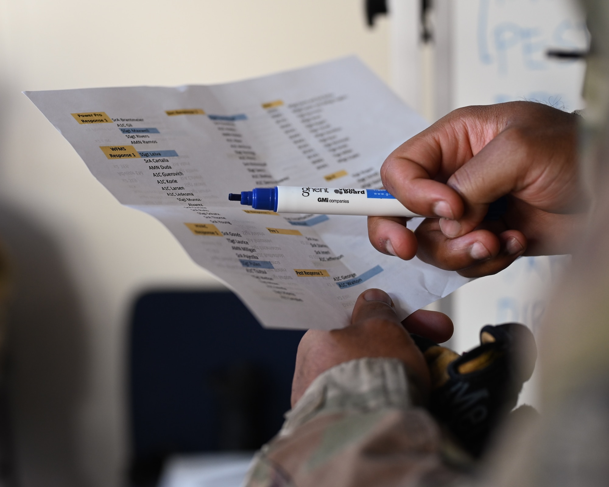 A U.S. Airmen assigned to the 4th Civil Engineer Squadron checks his roster during a bivouac training exercise at Seymour Johnson Air Force Base, North Carolina, Jan. 18, 2024. Over the course of the exercise, participants practiced building defensive fighting positions, responded to vehicle checkpoints, and performed post-attack reconnaissance sweeps , while demonstrating their ability to survive and operate in a hostile environment. (U.S. Air Force Photo by Airman Rebecca Tierney)
