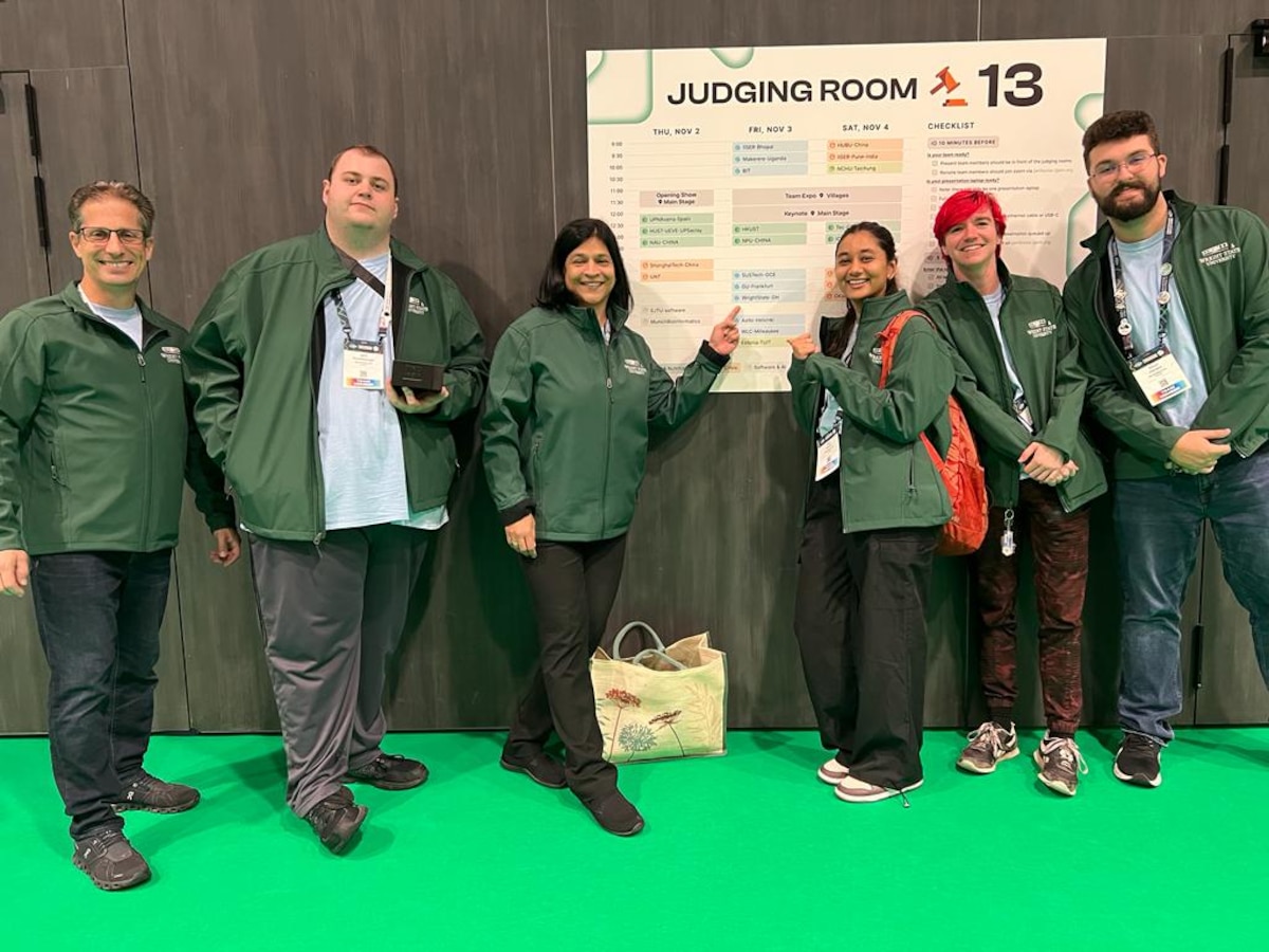 The Wright State University International Genetically Engineered Machine, or iGEM, team attends the annual iGEM Jamboree held in Paris, France, Nov. 3, 2023. The Wright State Team, sponsored by the Air Force Research Laboratory, took a gold medal at the Jamboree which hosted 4,000 attendees across 400 teams from over 50 countries, according to the organization’s website. Students from the AFRL-mentored iGEM teams have transitioned into the AFRL workforce by working part-time in AFRL-sponsored labs during their undergraduate studies and beyond (Courtesy photo / Dr. Madhavi Kadakia).
