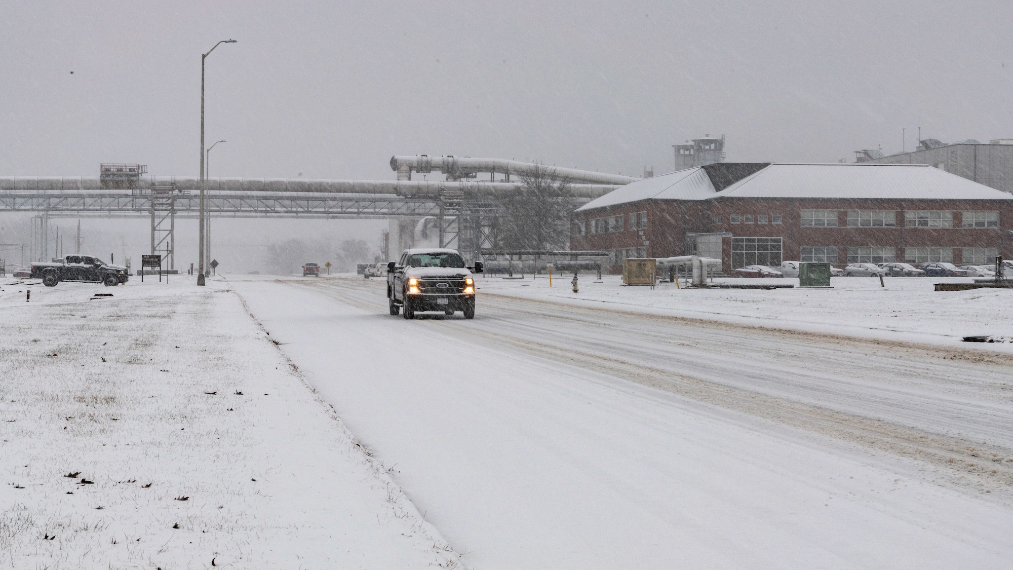 According to the National Weather Service, Nashville, the Arnold Air Force Base, Tenn., area saw snow accumulations up to 6 inches Monday, Jan. 15, 2024. Heavy snowfall could be seen on roadways and buildings base wide. (U.S. Air Force photo by Keith Thornburgh)