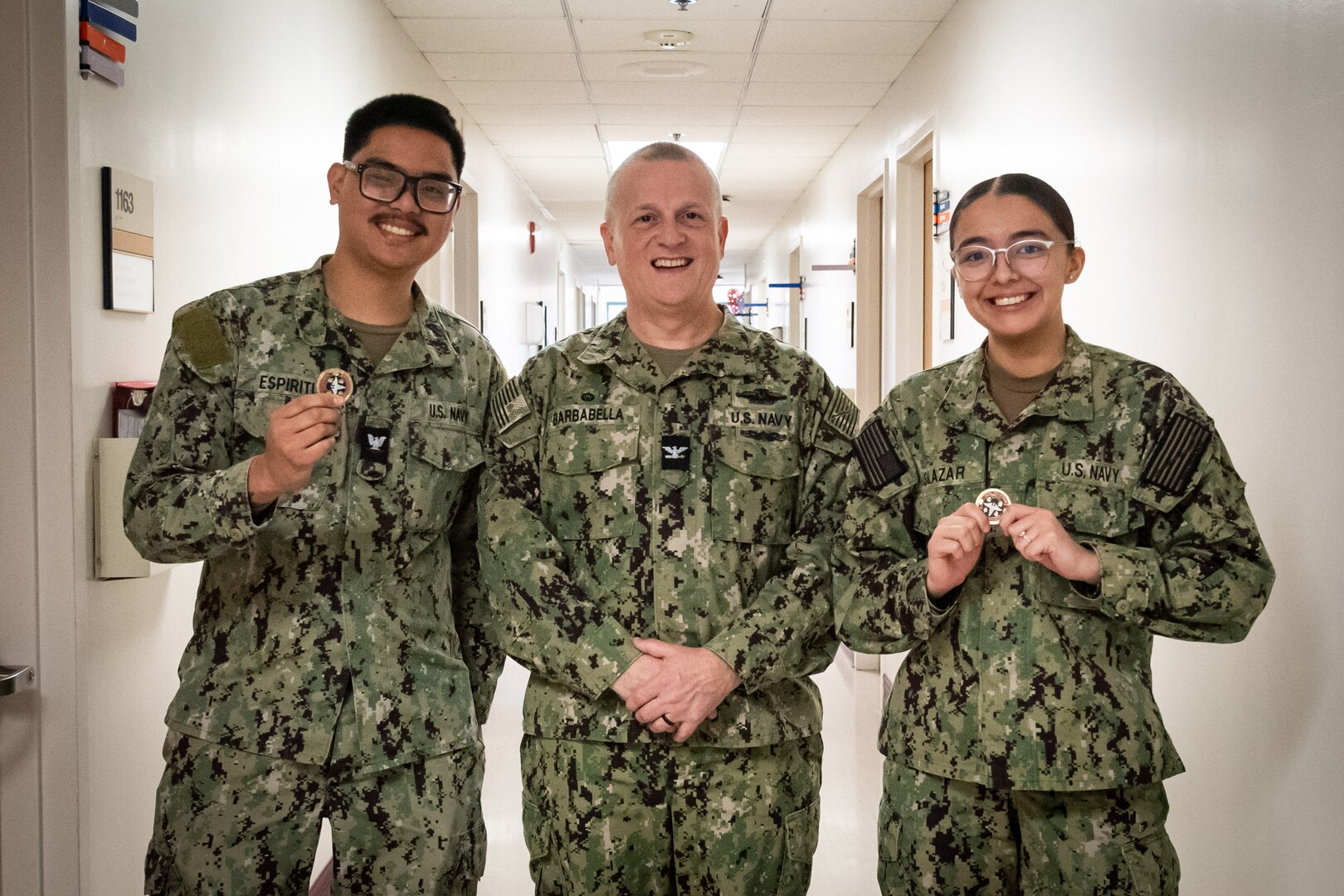 Hospital Corpsman Third Class Ernest Espiritu, left, and Hospitalman Nidya Salazar, right, were recognized by Capt. Sean Barbabella, Commander of Naval Health Clinic Cherry Point, for their excellence in patient care.

Espiritu and Salazar recently completed a process improvement project aboard the clinic involving the creation, implementation and sustainment of inventory binders. Both serve in the facility’s Patient Centered Medical Homeport.