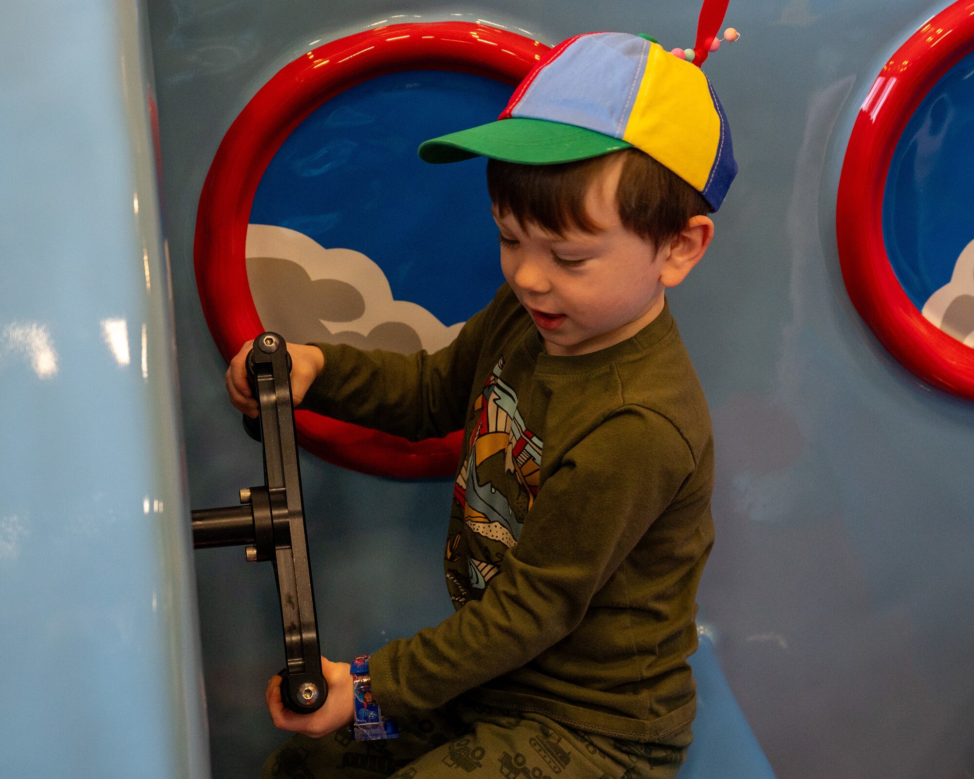 A child plays with an aircraft playset at the new indoor playground in the Losano Fitness Center at Laughlin Air Force Base, Texas, Jan. 20, 2024.