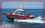 An Auxiliary vessel, NUSAR, and crew returns to Coast Guard Station Michigan City after completing a training exercise involving a paddleboarder in distress. This Chicago-based crew traveled across Lake Michigan from Coast Guard Station Chicago for a joint operations training event in Michigan City, Indiana involving active duty, Reserve and Auxiliary personnel in September 2023. The event included both fixed-wing aircraft and small boats - for this exercise, an AUXAIR crew spotted the paddleboarder in the water and routed the coordinates through the watchstanders to the small boats. (U.S. Coast Guard Auxiliary photo by John Saran, AUXPA1).