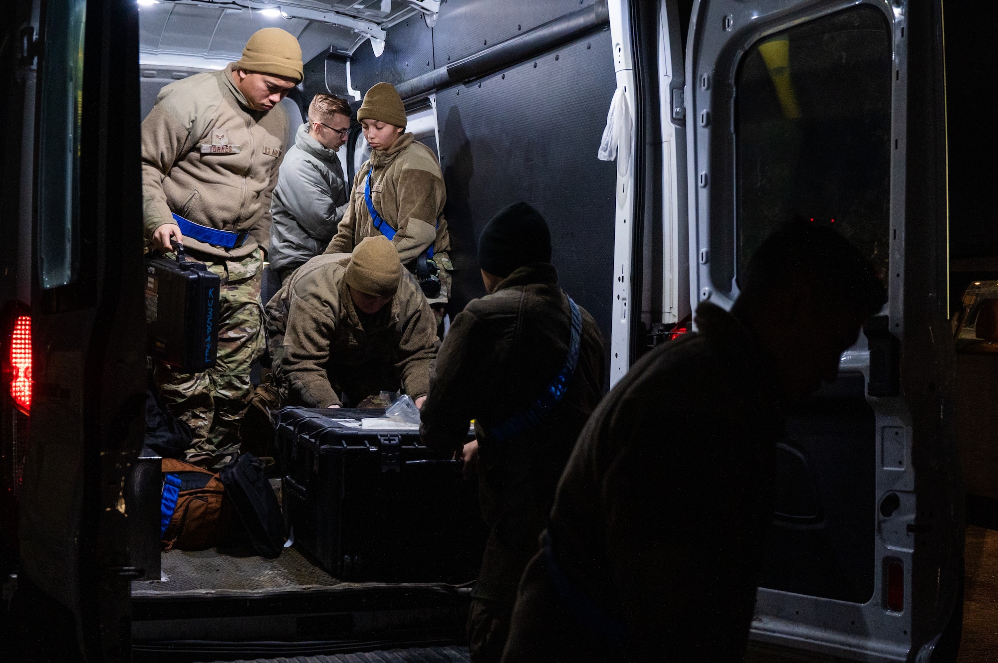 35th Fighter Generation Squadron members unload cargo before flying to Kadena Air Base.