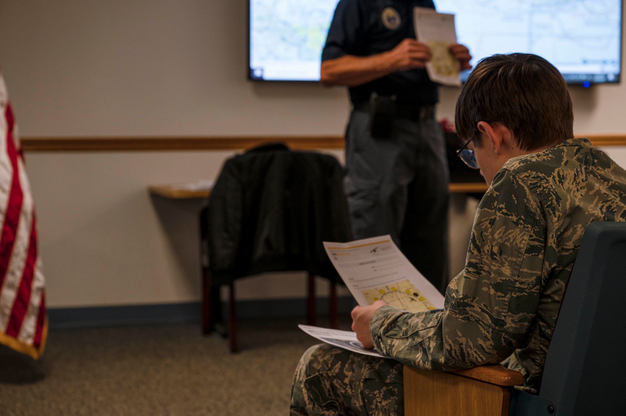 A Mississippi Civil Air Patrol Colonel Berta A. Edge Composite Squadron cadet listens to an aerospace briefing during a CAP meeting on Keesler Air Force Base, Mississippi, Jan. 9, 2024.