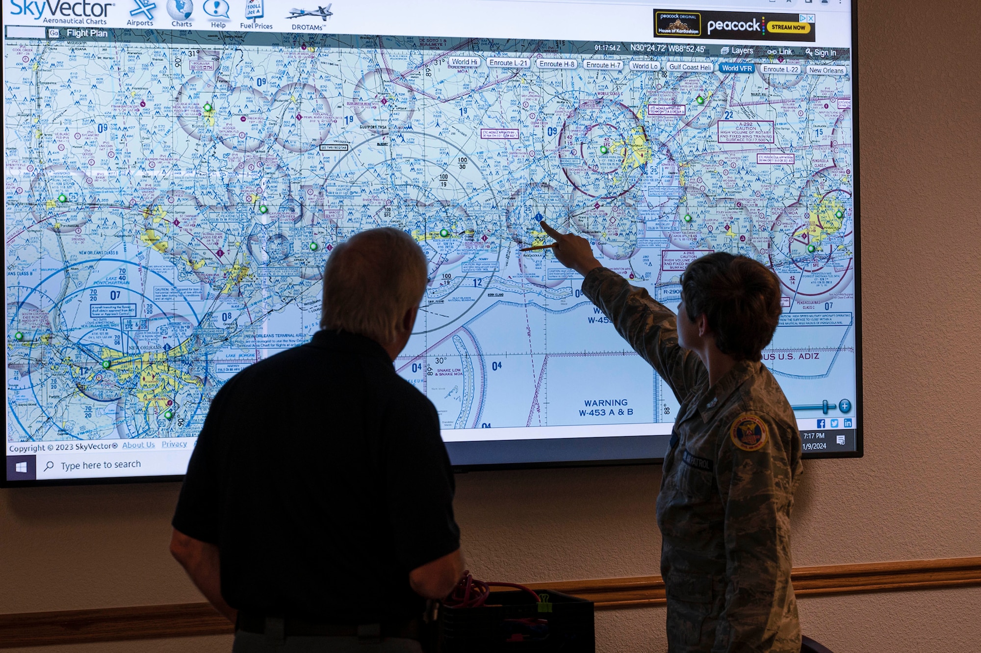 A Mississippi Civil Air Patrol Colonel Berta A. Edge Composite Squadron cadet locates a compass rose on a map during a CAP meeting on Keesler Air Force Base, Mississippi, Jan. 9, 2024.