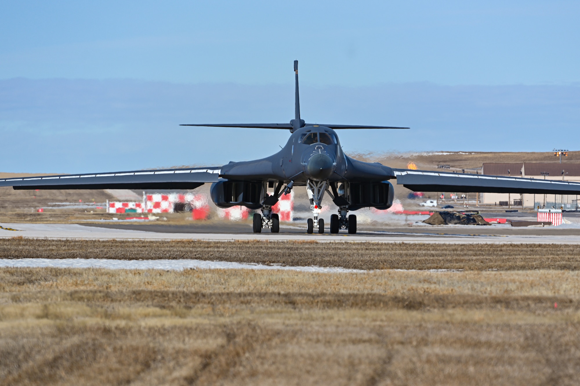 A B-1B Lancer assigned to the 37th Bomb Squadron taxis on the flightline at Ellsworth Air Force Base, South Dakota, Jan. 25, 2024. The flights are the first missions since the base’s airfield was closed Jan. 4 following the bomber crash where all four aircrew safely ejected. (U.S. Air Force photo by Staff Sgt. Jake Jacobsen)