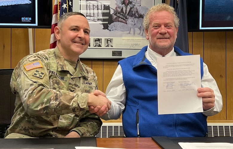 Col. Jeff Palazzini and Mayor John Handeland sign Port of Nome Modification Project partnership agreement