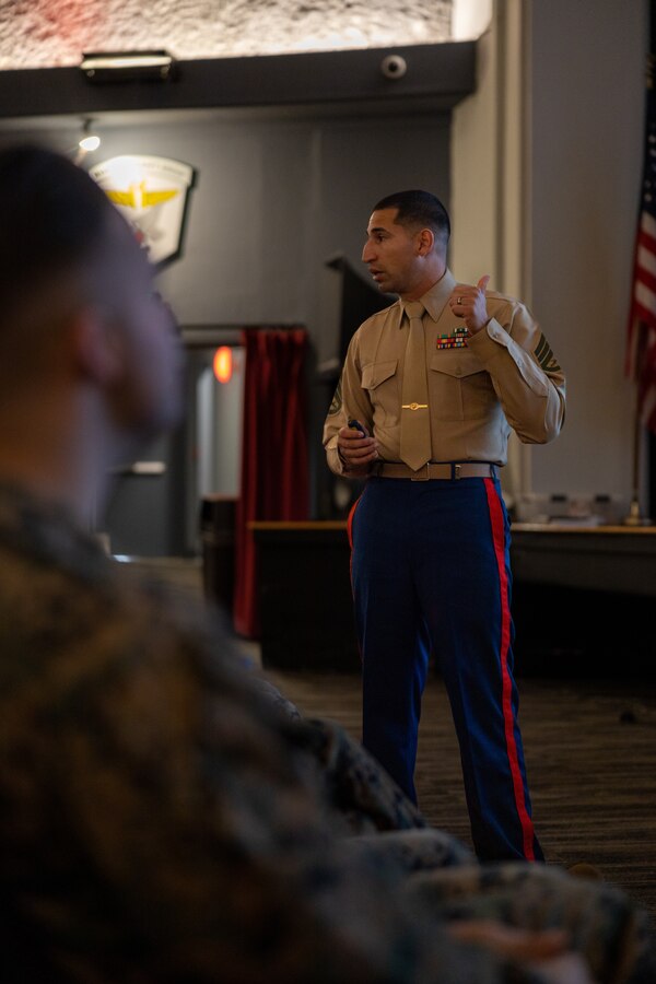 U.S. Marine Corps Staff Sgt. Andrew Diaz, an active reserve career planner with Marine Wing Headquarters Squadron 3, 3rd Marine Aircraft Wing, speaks to enlisted Marines during a Direct Affiliation Program brief at Marine Corps Air Station Miramar, California, Jan. 19, 2024.  DAP is an initiative that allows Marines to affiliate with a Selected Marine Corps Reserve unit or participate in the Individual Mobilization Augmentee program in a guaranteed billet following their end of active service. (U.S. Marine Corps photo by Cpl. Daniel Childs)