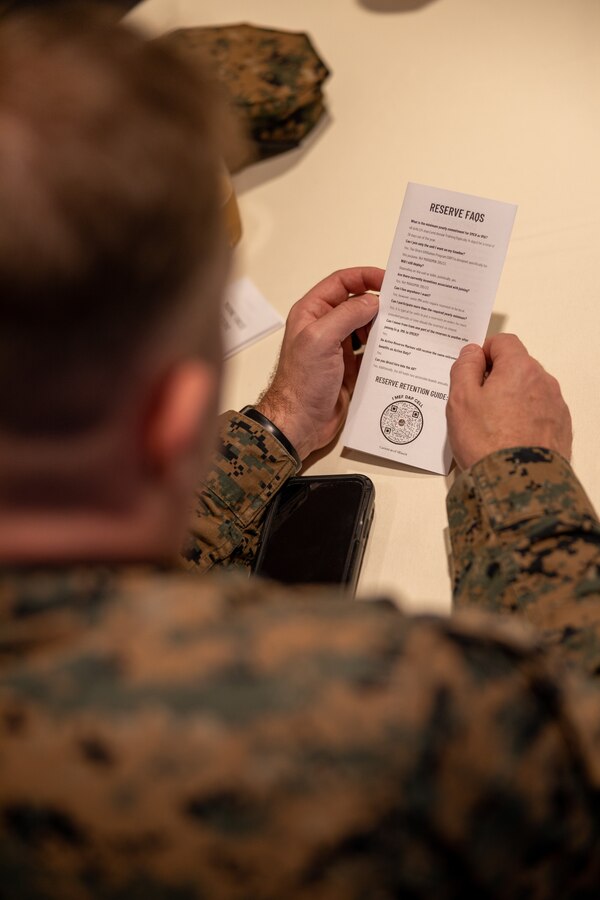 A U.S. Marine with 3rd Marine Aircraft Wing reviews a Marine Forces Reserve pamphlet during a Direct Affiliation Program brief at Marine Corps Air Station Miramar, California, Jan. 19, 2024.  DAP is an initiative that allows Marines to affiliate with a Selected Marine Corps Reserve unit or participate in the Individual Mobilization Augmentee program in a guaranteed billet following their end of active service. (U.S. Marine Corps photo by Cpl. Daniel Childs)