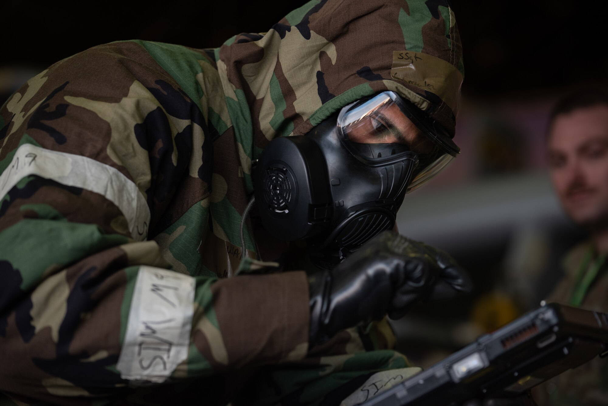 U.S. Air Force Tech. Sgt. Jonathan Gonzalez, 25th Fighter Generation Squadron weapons load crew member, checks a technical order at Osan Air Base, Republic of Korea, Jan. 19, 2024. Technical orders are used to verify steps, notes, cautions and warnings have been complied with while loading weapons onto aircraft. Meticulous attention to detail enhances mission execution by minimizing risk of errors and ensuring precision. (U.S. Air Force photo by Senior Airman Brittany Russell)