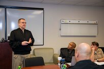 240118-N-KC192-2004 PORTSMOUTH, Va. (Jan. 18, 2024) Rear Adm. Eric Peterson, the deputy commander of Reserve Component Naval Medical Forces Atlantic (NMFL), and director, Navy Reserve Nurse Corps, briefs reserve prospective commanding officers, executive officers and senior enlisted leaders during an annual reserve leadership synch on board NSA Hampton Roads - Portsmouth Annex, Jan. 18, 2024. The synch included training and mentorship opportunities for prospective commanding and executive officers along with their senior enlisted leaders across the region and to ensure alignment on future and current efforts are maintained. (U.S. Navy photo by Mass Communication Specialist 2nd Class Levi Decker)