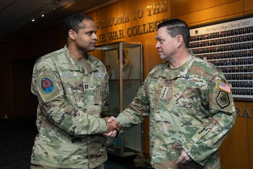 Chief of Space Operations Gen. Chance Saltzman coins U.S. Space Force Capt. Rolfy Caceres, Deputy Commander, Detachment 2, 13th Delta Operations Squadron