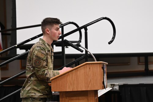 An Airman concludes a Martin Luther King Jr. remembrance event