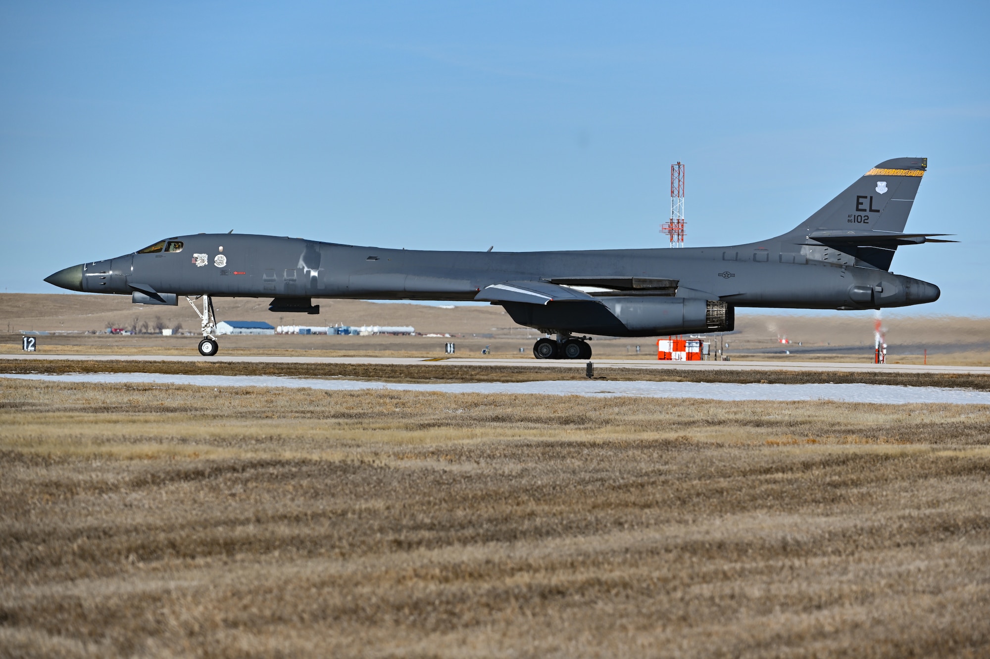 A B-1B Lancer assigned to the 37th Bomb Squadron taxis onto the runway at Ellsworth Air Force Base, South Dakota, Jan. 25, 2024. Upon completion of the take-off’s, the airfield was closed again until further notice as the accident investigation team continues its work. (U.S. Air Force photo by Staff Sgt. Jake Jacobsen)