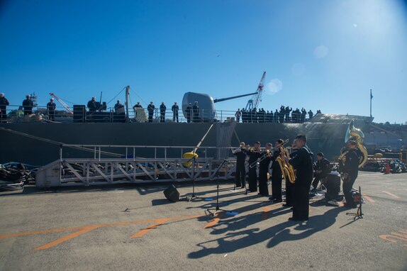 240126-N-YQ181-1069 YOKOSUKA, Japan (Jan. 26, 2024) Sailors assigned to the U.S. 7th Fleet band perform in front of the Ticonderoga-class guided-missile cruiser USS Antietam (CG 54), in Yokosuka, Japan, Jan. 26. USS Antietam departed Yokosuka for the final time before transiting to its new homeport of Pearl Harbor, Hawaii, as part of a planned rotation of forces in the Pacific. (U.S. Navy photo by Mass Communication Specialist 2nd Class Askia Collins)