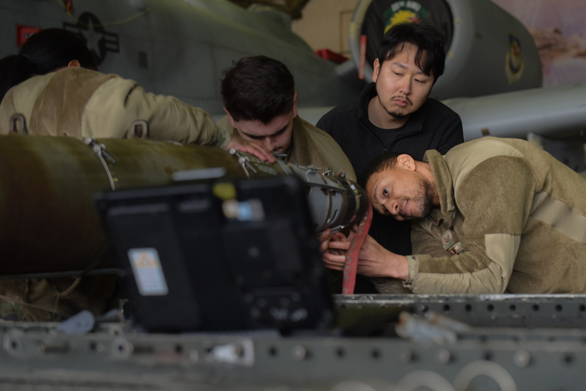 Members from the 51st Munitions Squadron, participate in the annual bomb building and weapons Load Crew Competition at Osan Air Base, Republic of Korea, Jan. 19, 2024. Members assembled a GBU-54, which is a 500-pound precision weapon equipped with a special targeting system. This annual competition provides a hands-on opportunity for Airmen to refine their technical expertise and teamwork. (U.S. Air Force photo by Senior Airman Brittany Russell)
