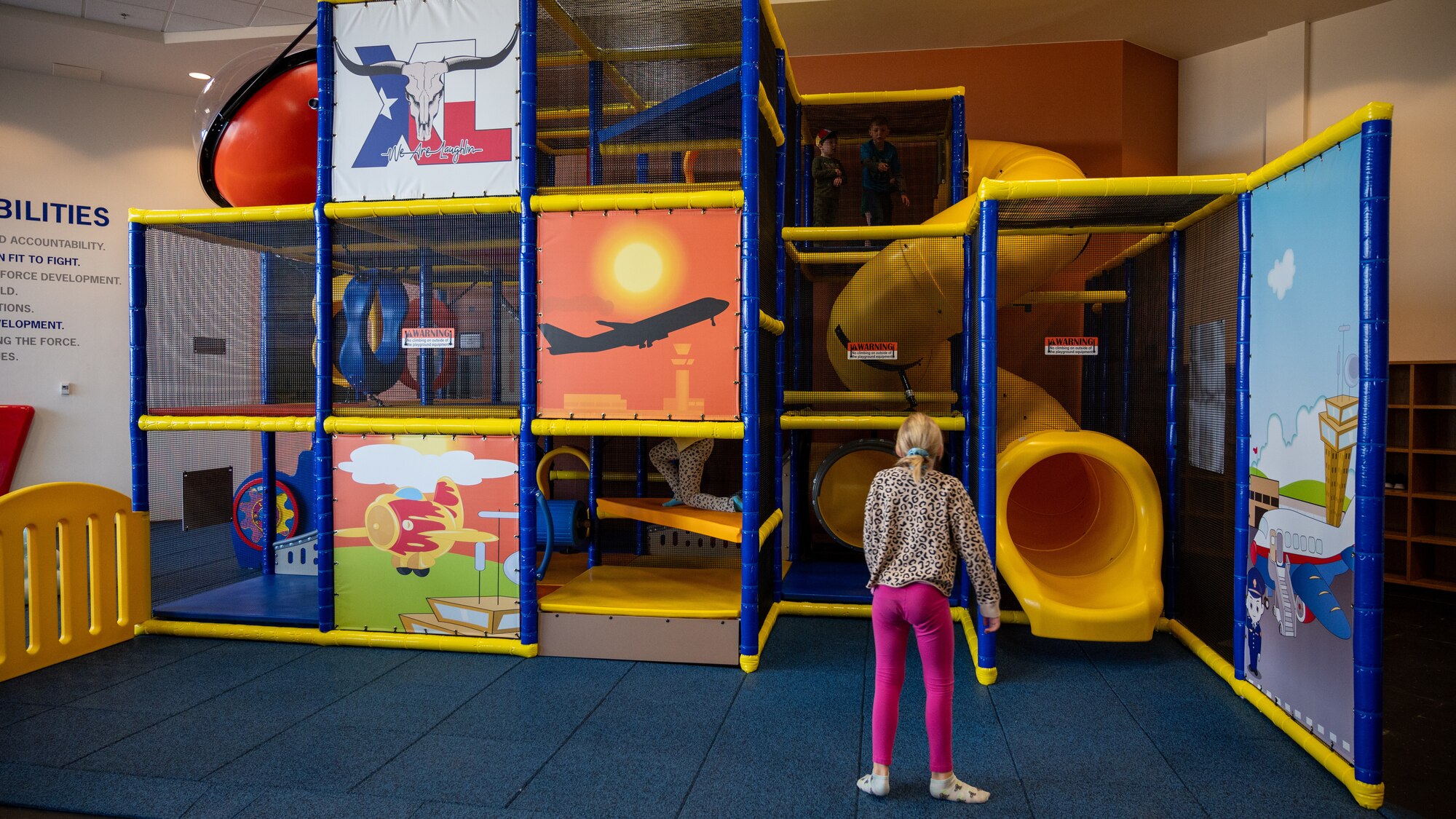 Children play in and around the new indoor playground in the Losano Fitness Center at Laughlin Air Force Base, Texas, Jan. 20, 2024.