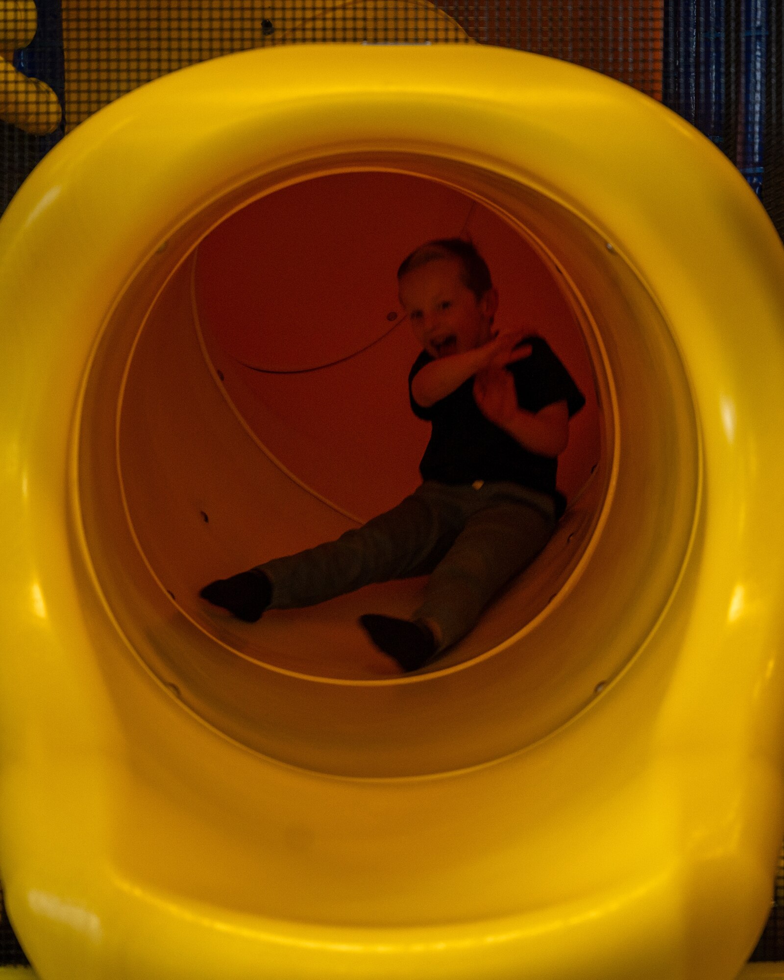 A child goes down the slide at the new indoor playground in the Losano Fitness Center at Laughlin Air Force Base, Texas, Jan. 20, 2024.