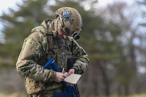 A U.S. Air Force Explosive Ordnance Disposal (EOD) technician takes note of his situation during the HABU exercise at Misawa Air Base, Japan, Jan. 23, 2024.