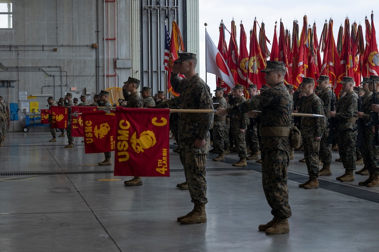 U.S. Marines with III Marine Expeditionary Force stand in formation during the III MEF change of command ceremony on Marine Corps Air Station Futenma, Okinawa, Japan, Jan. 26, 2024. During the ceremony, Lt. Gen. James W. Bierman relinquished his duties as commanding general of III MEF to Lt. Gen. Roger B. Turner. (U.S. Marine Corps photo by Sgt. Savannah Mesimer)