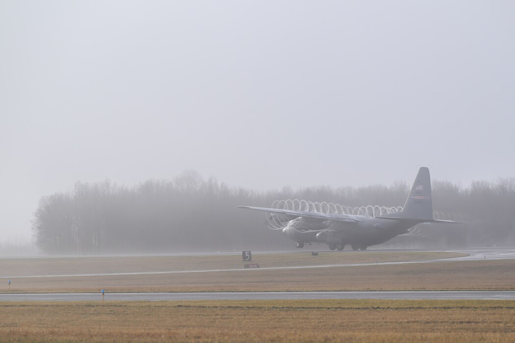 A C-130H Hercules aircraft assigned to the 910th Airlift Wing takes off as the fog lifts at Youngstown Air Reserve Station, Ohio, Jan. 25, 2024.