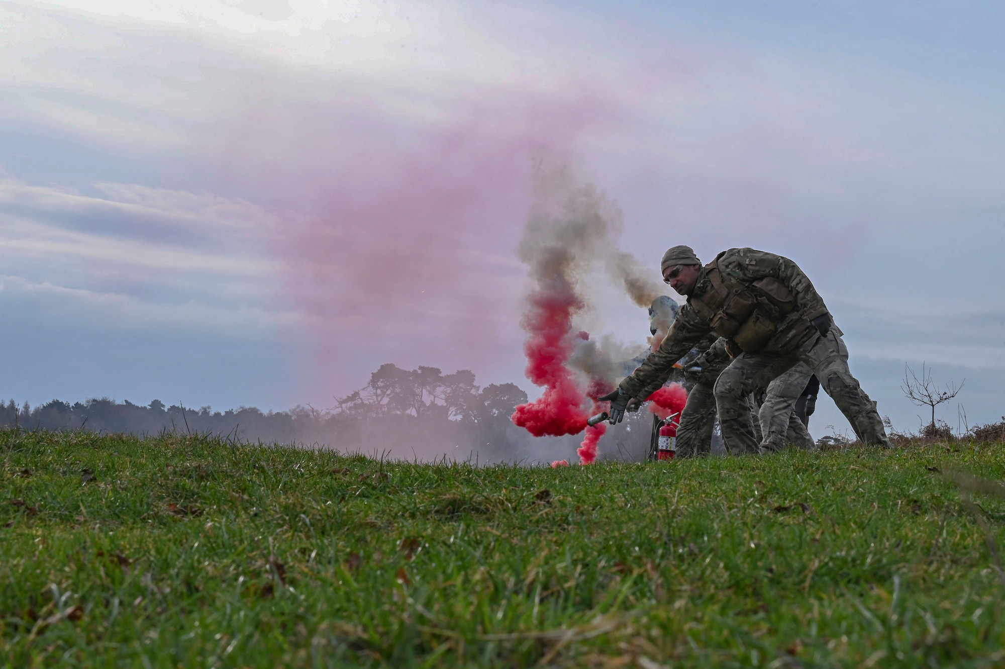 Survival, evasion, resistance and escape instructors trained Airmen on combat survival training in which they simulate how to survive and make contact with recovery personnel after landing in enemy territory.