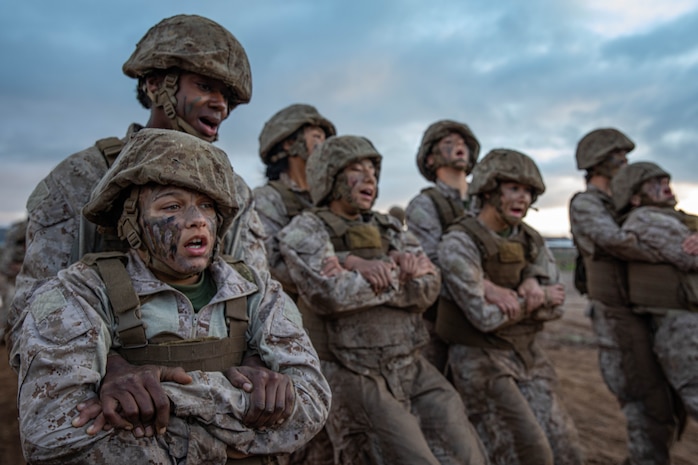 U.S Marine Corps recruits with Echo Company, 2nd Recruit Training Battalion, execute buddy drags during the Crucible at Marine Corps Base Camp Pendleton, California, Jan. 23, 2024. The Crucible is a 54-hour exercise where recruits apply the knowledge and training they’ve learned throughout recruit training to earn the title of United States Marine. (U.S. Marine Corps photo by Lance Cpl. Sarah M. Grawcock)