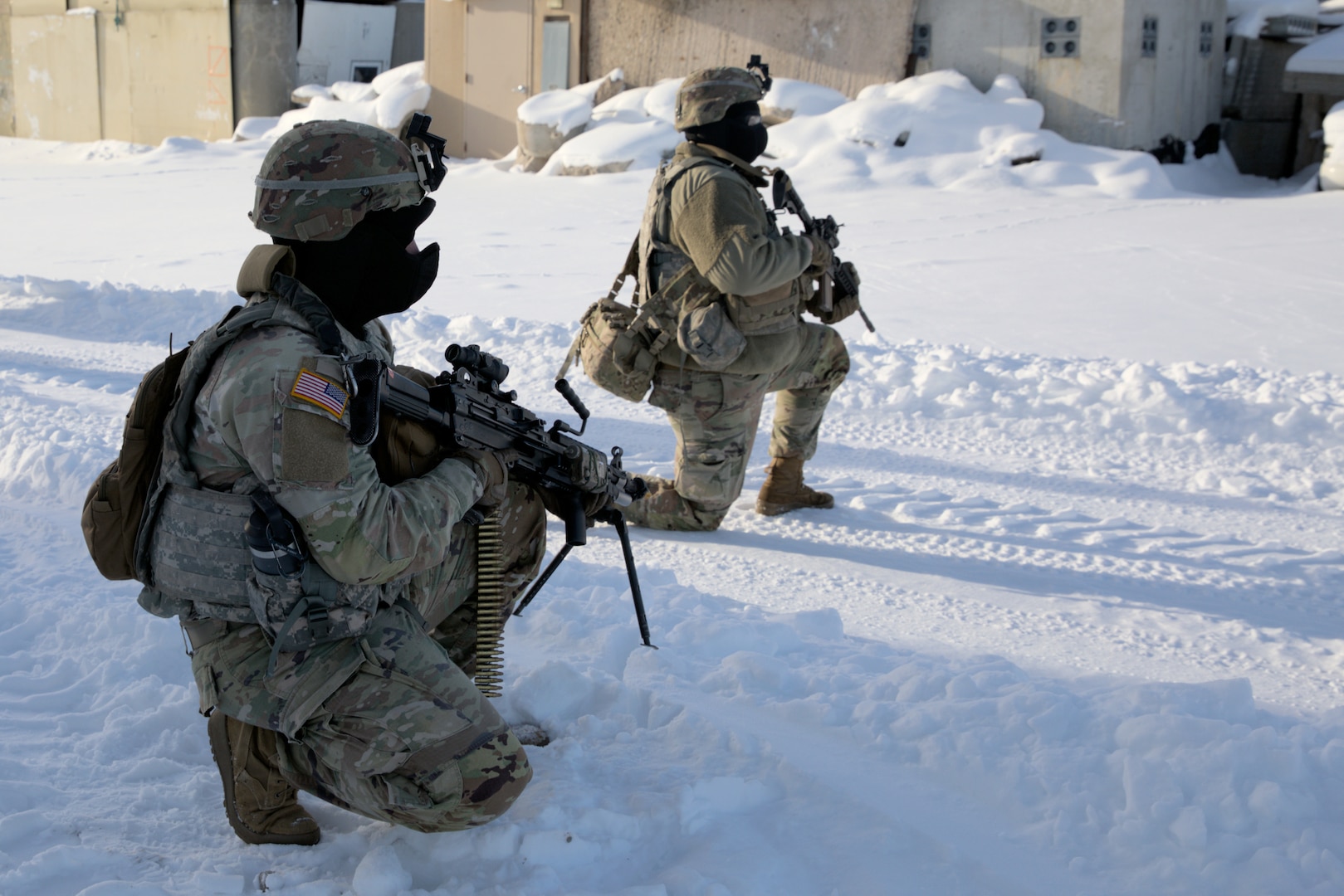 Wisconsin Army National Guard Soldiers with Company A, 2nd Battalion, 127th Infantry Regiment, approach the High Risk Entry Facility Jan. 17 at Volk Field, Wis., during urban warfare training.