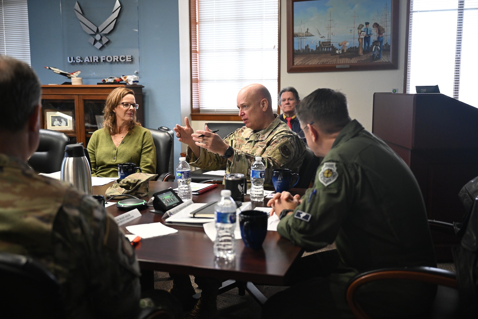 Maj. Gen. Thomas Harrell, director, Defense Health Network Central, Defense Health Agency; director, San Antonio Market; commander, 59th Medical Wing; and the lead for Air Force Medical Agency Alpha, responds to a question about healthcare access for recruiters during a meeting at Joint Base San Antonio-Randolph, Texas, Jan. 11, 2024.