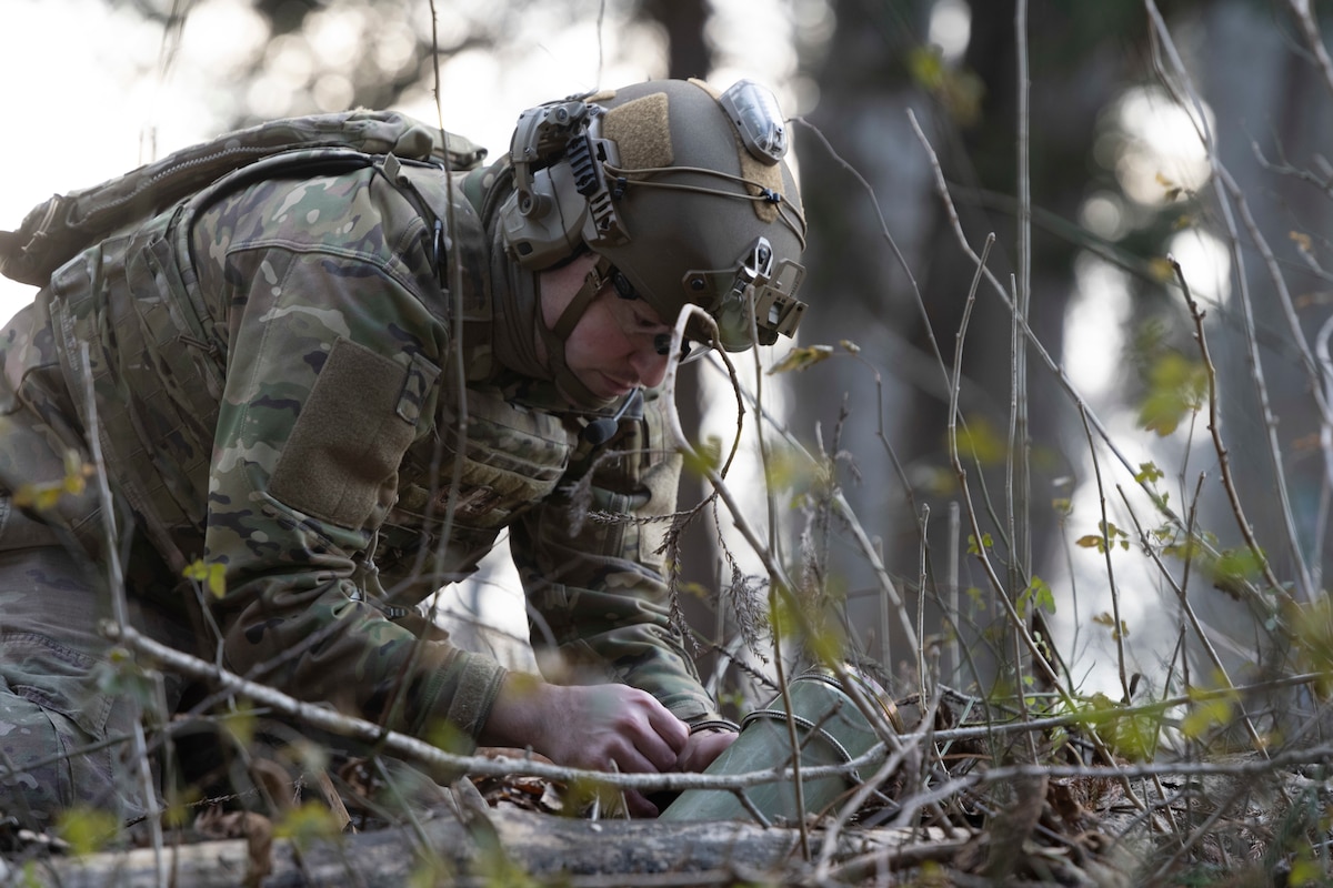 A U.S. Air Force Explosive Ordnance Disposal (EOD) technician prepares a training Unexploded Ordnance (UXO) for removal during the HABU exercise at Misawa Air Base, Japan, Jan. 23, 2024.