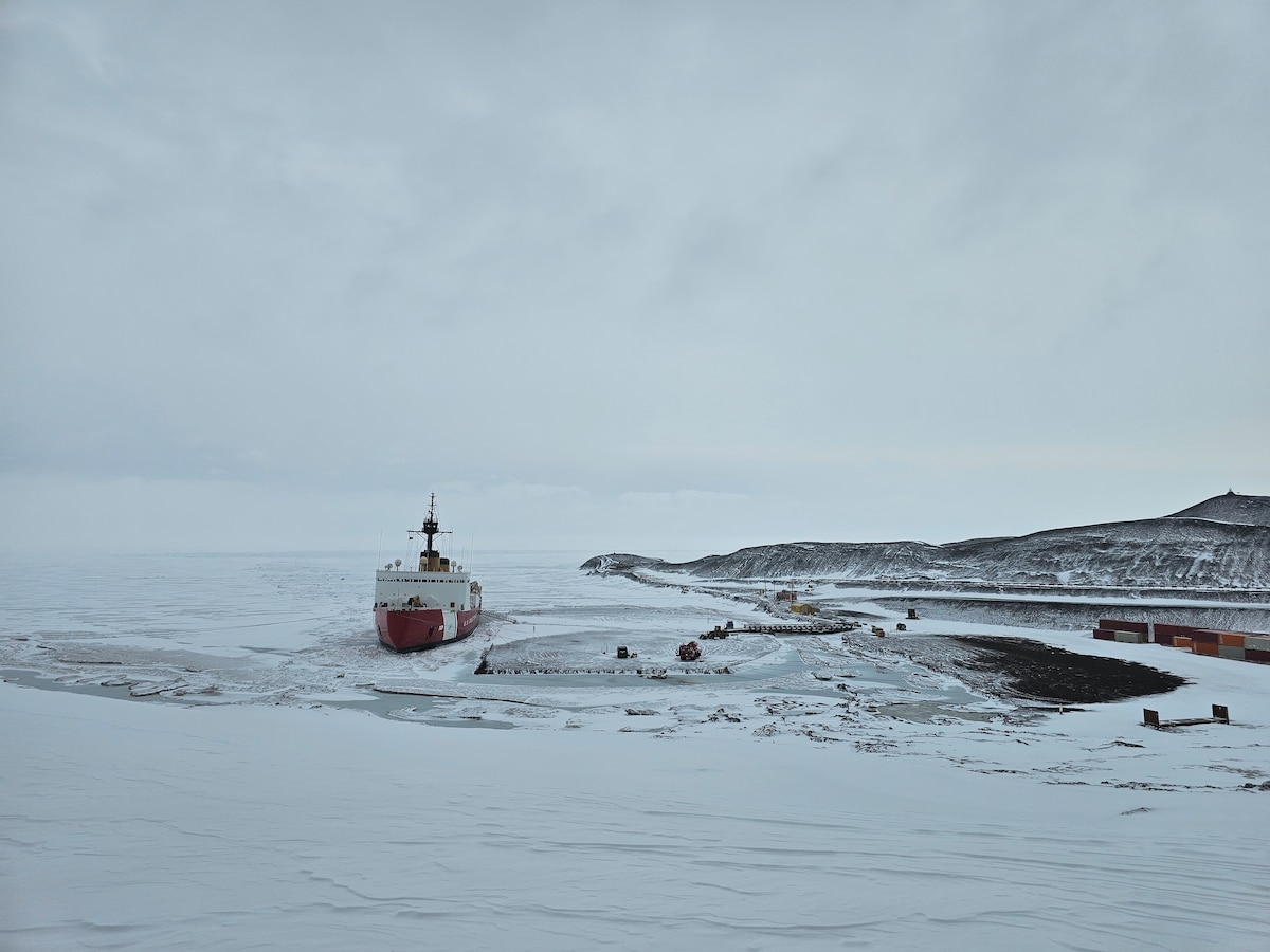 The Coast Guard Cutter Polar Star (WAGB 10) is seen moored up to the ice pier at McMurdo Station, Antarctica, Jan. 17, 2024. Operation Deep Freeze is one of many operations in the Indo-Pacific in which the U.S. military promotes security and stability across the region. (U.S. Coast Guard photo by Petty Officer 2nd Class Ryan Graves)