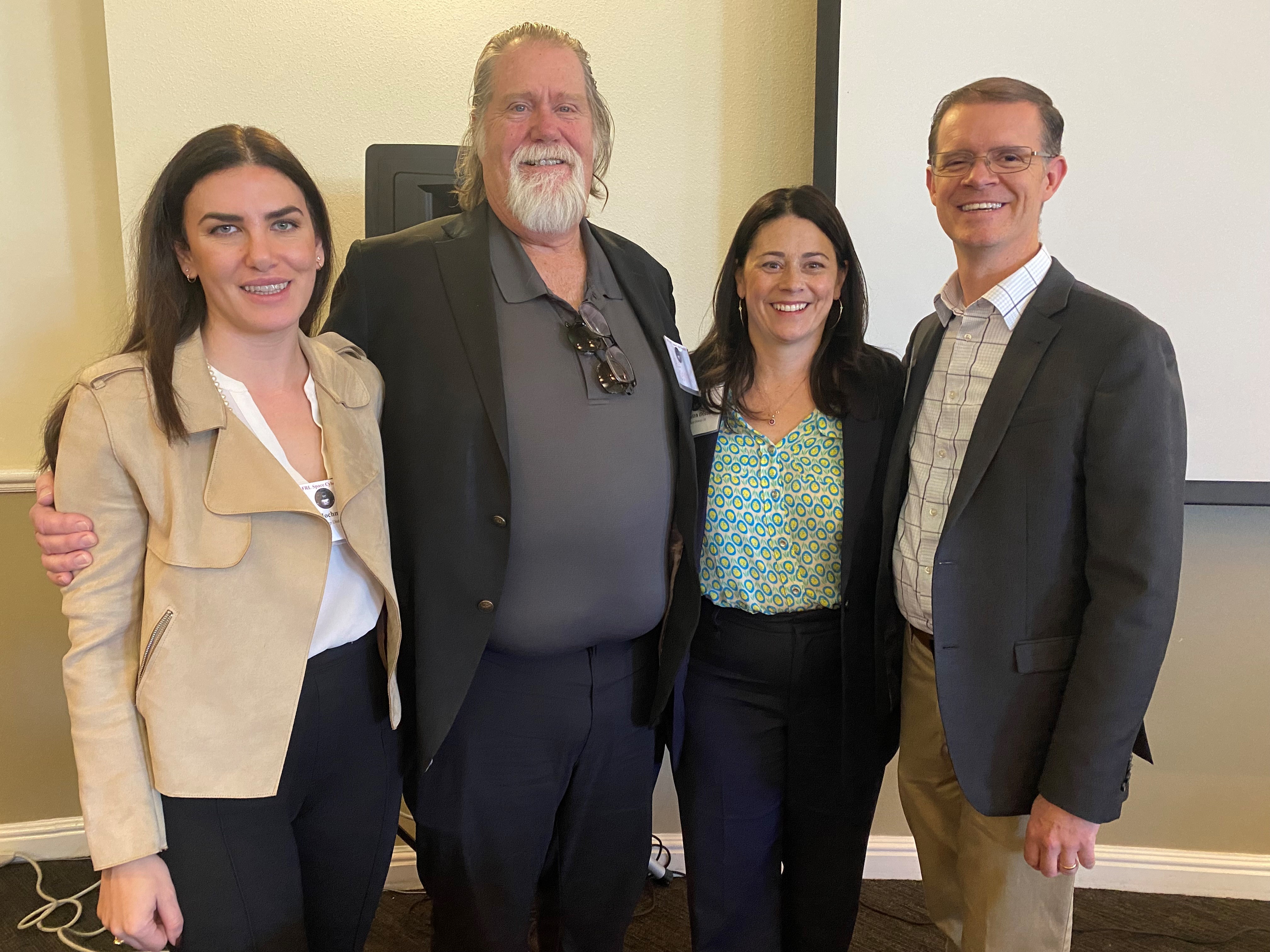 From left: State Representative Dayan Hochman-Vigil; Dale Dekker, Founder of Dekker Perich Sabatini; State Representative Meredith Dixon, District 20 and 15, Bernalillo County; and State Representative Jason C. Harper, District 57, Sandoval County pose before a panel discussion at the third annual Air Force Research Laboratory Cyber and Space Summit, Oct. 11, 2023, at the Science and Technology Park, University of New Mexico, Rotunda, Albuquerque, N.M. The summit aimed to initiate the expansion of space cyber topics in New Mexico, anticipating technology growth in the coming decades. (U.S. Air Force photo / Jessie Perkins)