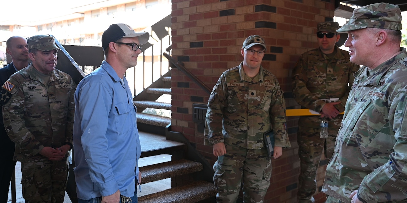 U.S. Air Force Brig. Gen. William Kale, Air Force Civil Engineer Center, Air Force Installation and Mission Support Center, Air Force Materiel Command commander, speaks to Tim Joy, 17th Civil Engineering operations manager. 17th CES provides the quality facilities, infrastructure, and customer service necessary to produce Fire Protection and Intelligence, Surveillance, and Reconnaissance professionals. (U.S. Air Force photo by Airman 1st Class Evelyn D’Errico)