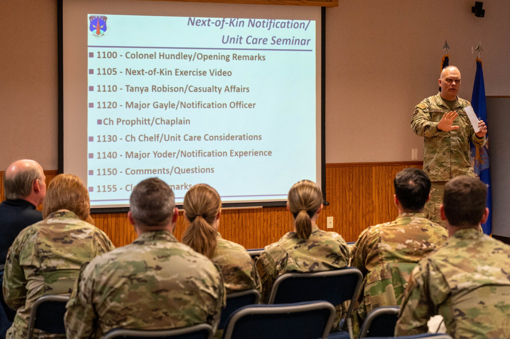 chaplain in uniform addressing a classroom