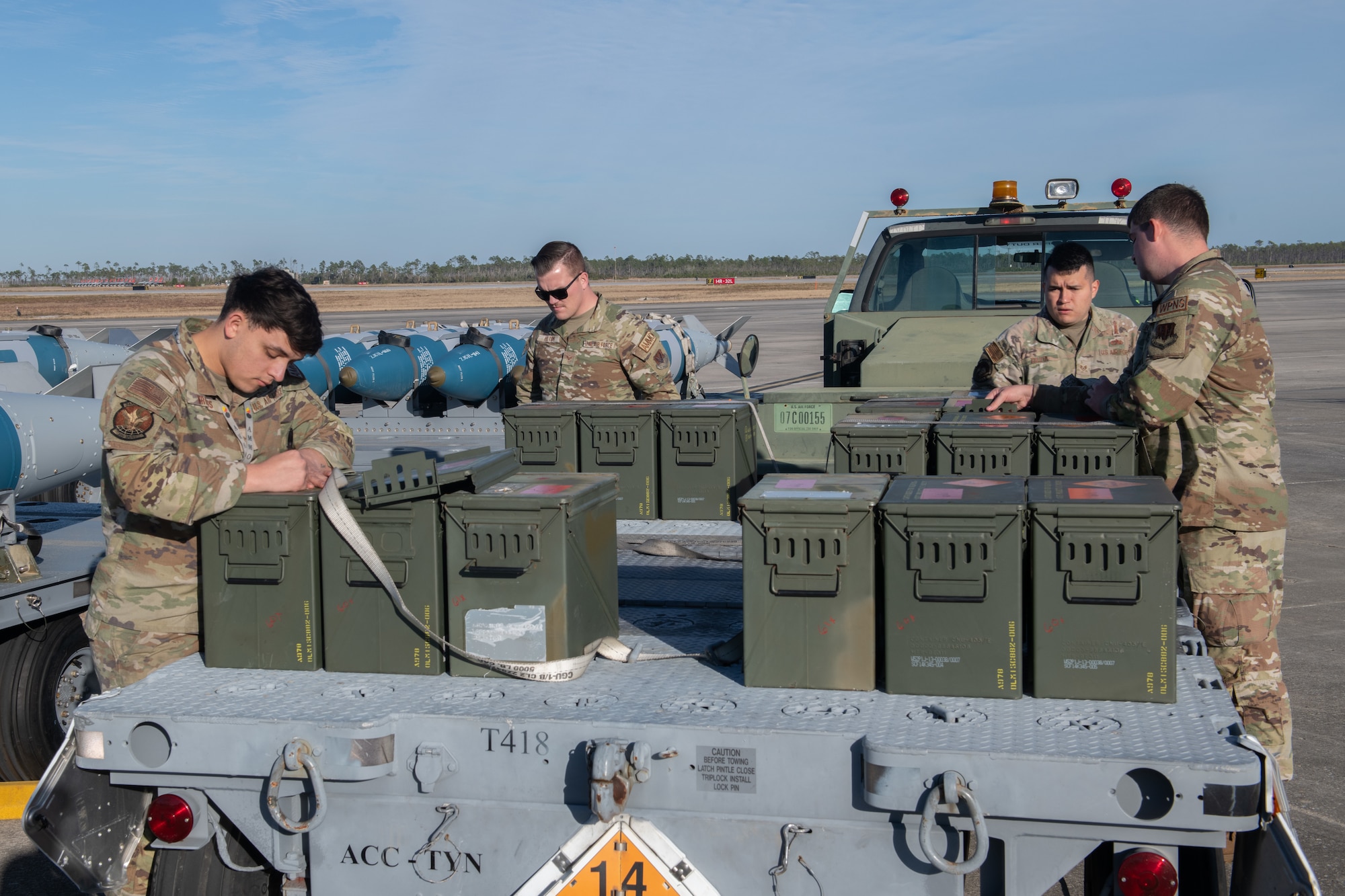 men move ammo cans
