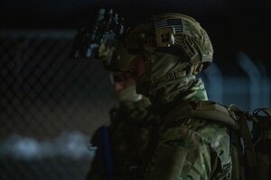 U.S. Air Force Explosive Ordnance Disposal (EOD) technicians listen to a briefing before approaching a booby-trapped train car during the HABU exercise at Misawa Air Base, Japan, Jan. 23, 2024.