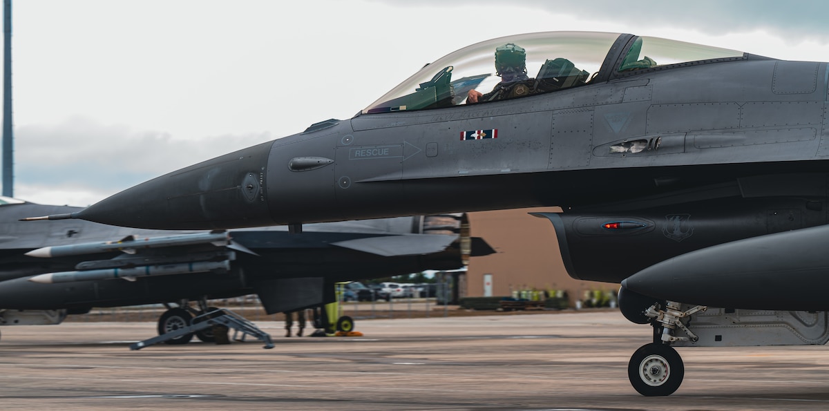 Jet taxis on flightline