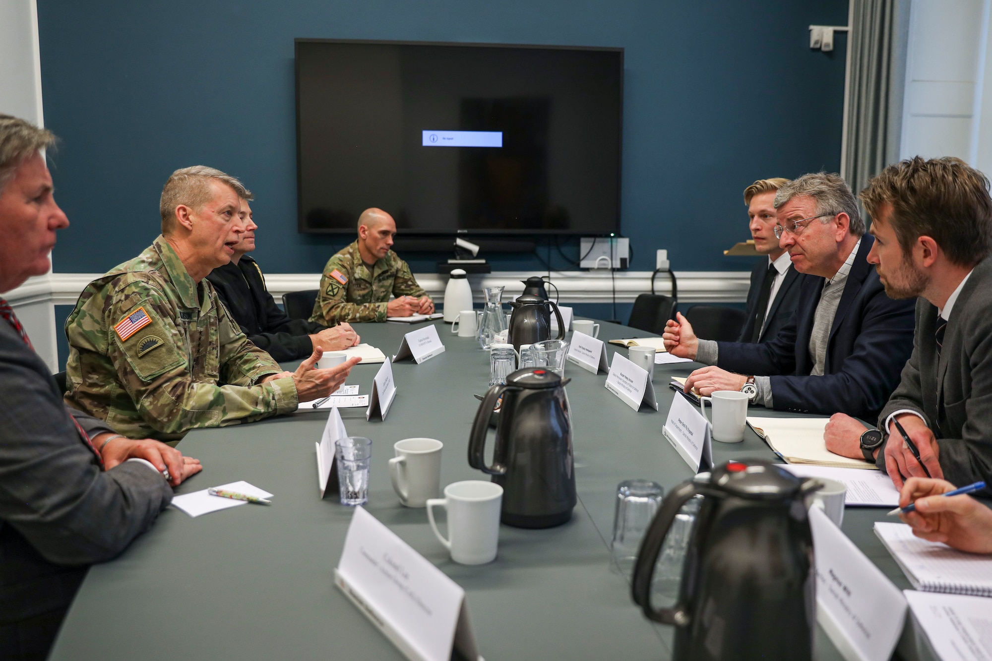 Army Gen. Daniel Hokanson, chief of the National Guard Bureau, left, talks with Kasper Høeg-Jensen, Denmark Deputy Permanent Secretary of State for Defense Policy, at the Ministry of Defense, Copenhagen, Denmark, Jan. 23, 2024.