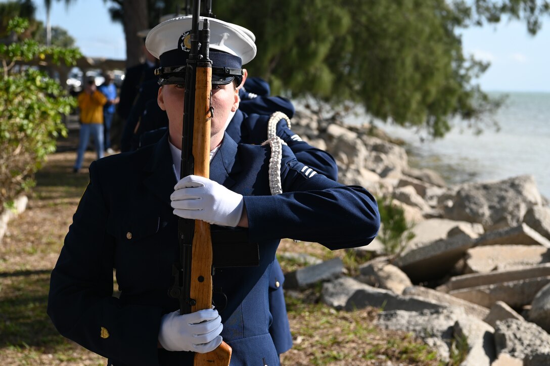 Coast Guard Honor Guard performing the 21-gun salute in respect to the CGC Blackthorn's crew. 44 years ago, Blackthorn collided with the motor vessel Capricorn near the Skyway Bridge and 23 members of the crew were lost. (U.S. Coast Guard photo by Petty Officer 3rd Class Nicholas Strasburg)