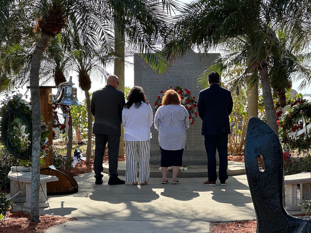 Family members of the fallen Coast Guard Cutter Blackthorn crew place a wreath and pay their respects in front of the Coast Guard Cutter Blackthorn memorial, Jan. 28, 2024, St. Petersburg, Florida. 44 years ago, Blackthorn collided with the motor vessel Capricorn near the Skyway Bridge and 23 members of the crew were lost. (Coast Guard photo by Petty Officer 1st Class Nicole J. Groll)