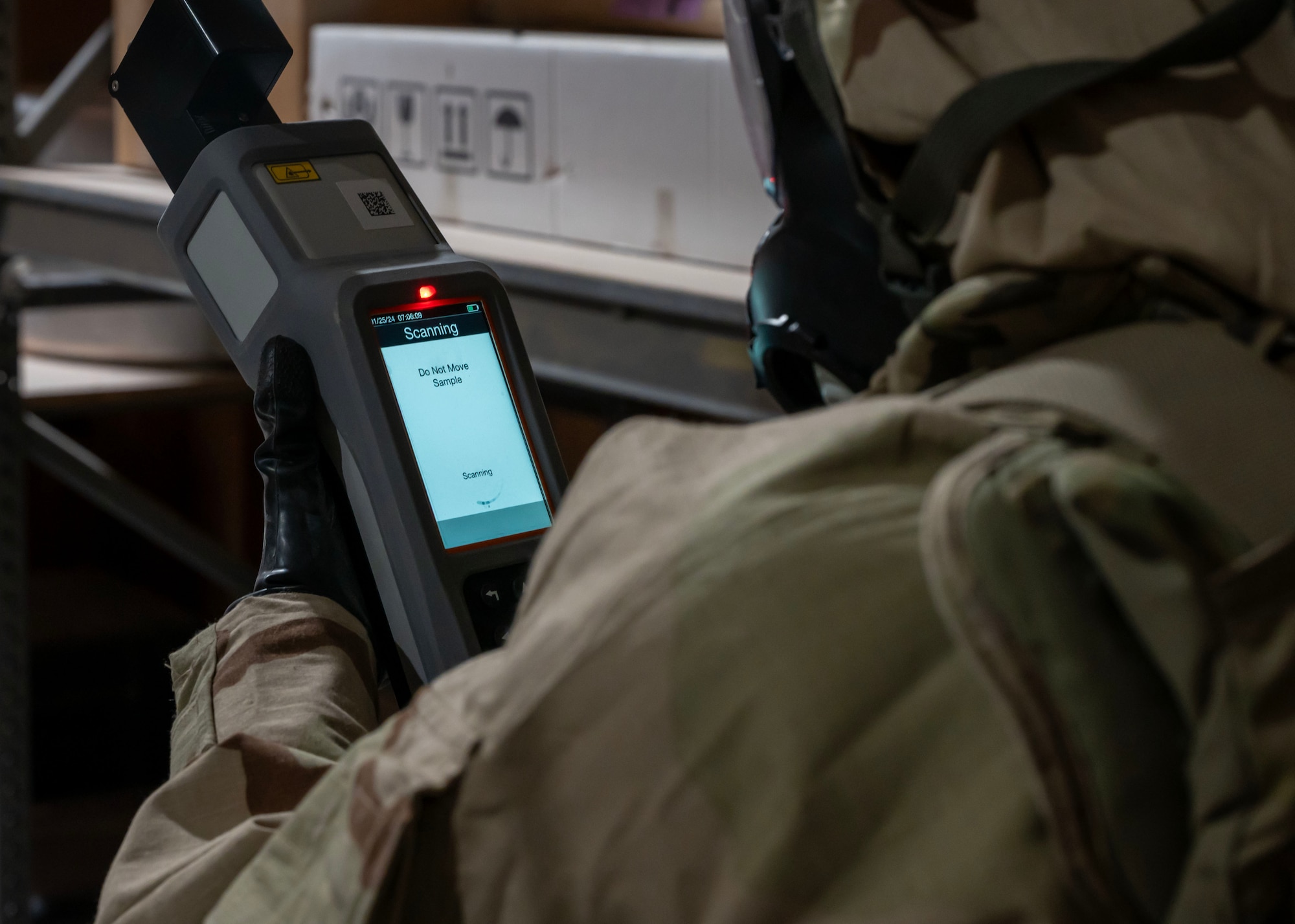 U.S. Air Force Senior Airman Kiyana Horne, emergency management technician, tests a vile during exercise Desert Dragon 2024 at an undisclosed location in the U.S. Central Command area of responsibility, Jan. 22, 2024. The Desert Dragon exercise is conducted each rotation and ensures that emergency management Airmen are well-prepared to fulfill a pivotal role in readiness, mitigation, response, and recovery from disasters, while also offering CBRN advisement to wing commanders. (U.S. Air Force photo by Senior Airman Sarah Williams)