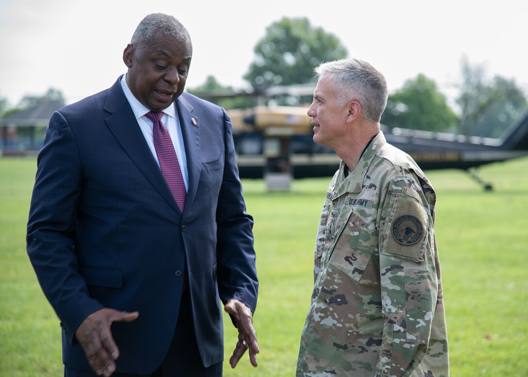 General Nakasone greets Secretary of Defense, Lloyd J. Austin III as he arrives for a visit.