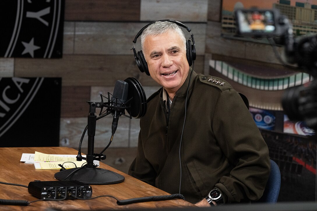 General Nakasone laughs while recording a recent podcast episode.