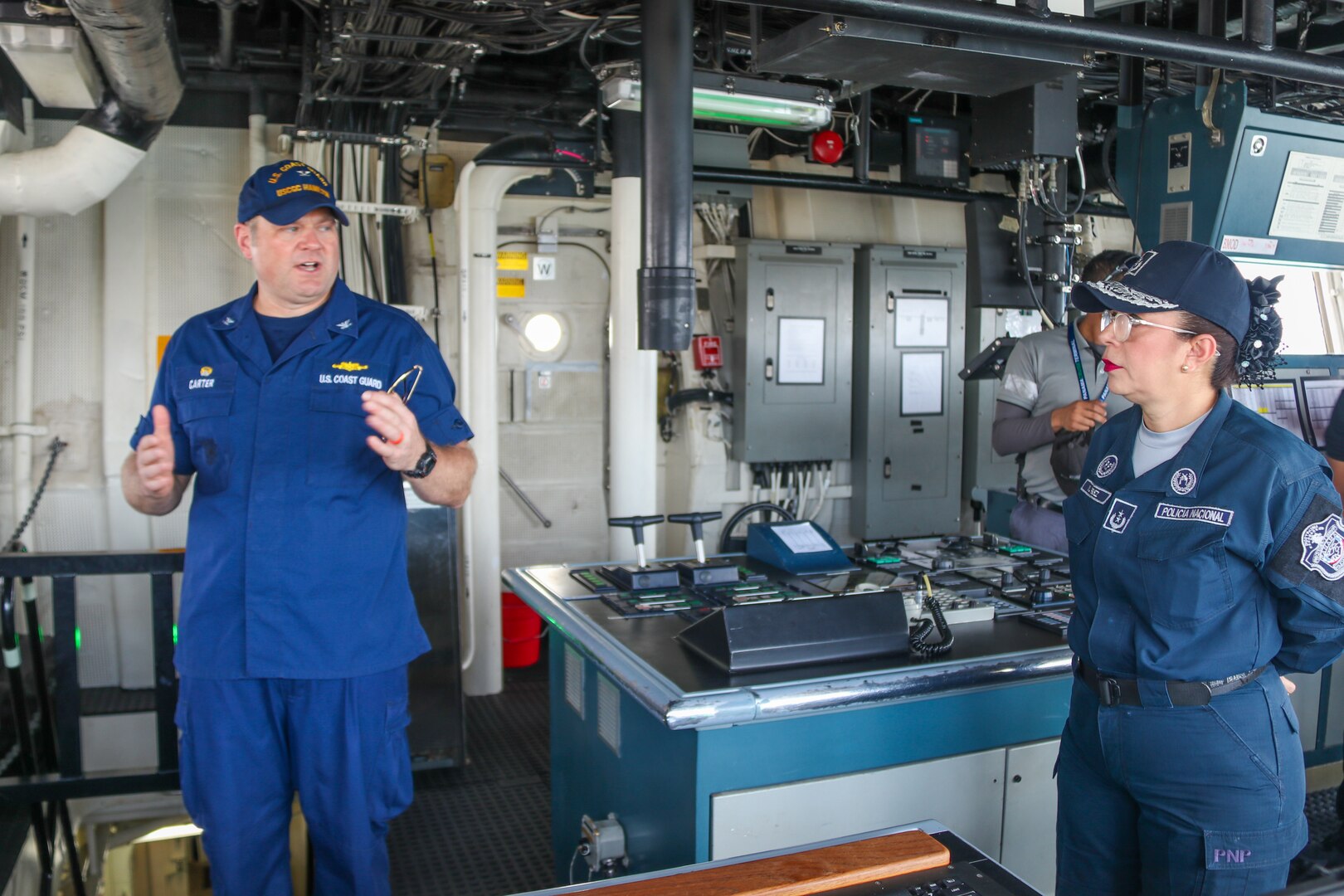 U.S. Coast Guard Capt. Justin Carter, the commanding officer of Coast Guard Cutter Hamilton (WMSL 753) left, provides a tour to local Panamanian law enforcement, in Panama City, Panama, Jan. 24, 2024. Hamilton became the first U.S. government vessel to moor at the newly constructed Amador cruise terminal. (U.S. Coast Guard photo by Ensign Ray Corniel)