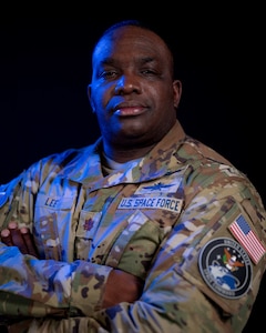 United States Space Force Maj. Julius Lee poses for a portrait at Peterson Space Force Base, Colorado, January 29th, 2024. Currently serving at Headquarters, United States Space Command, Lee transferred to the Space Force from the U.S. Army. (U.S. Space Force photo by Dave Grim)