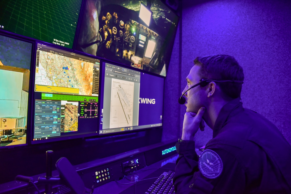 Craig Milliard, Xwing flight test manager, monitors an autonomous flight from the Xwing ground control station at McClellan Airfield in Sacramento, California, Jan. 26, 2024. Xwing's autonomous flight technology allows its aircraft to taxi, takeoff, fly to a destination, avoid airborne and ground threats, and land, without any human input. (U.S. Air Force photo by Matthew Clouse)