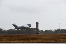 A photo of an aircraft taking off.