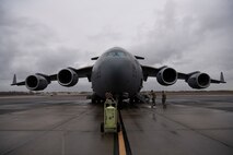 A photo of Airmen performing preflight checks.